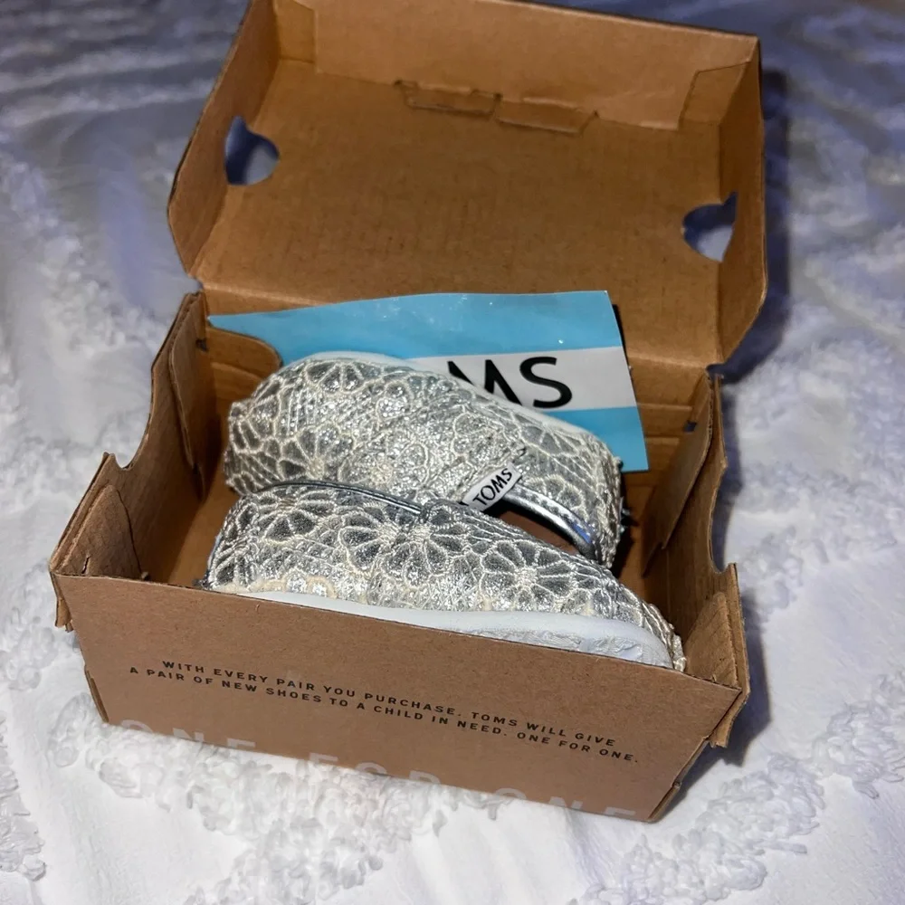 TOMS Tiny Moccasins in Shimmering Silver